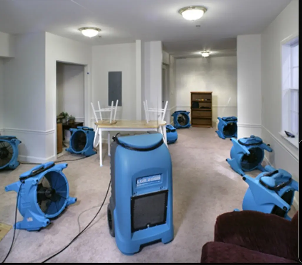 Air movers and dehumidifier setup for Water Damage Restoration in Oak Hill